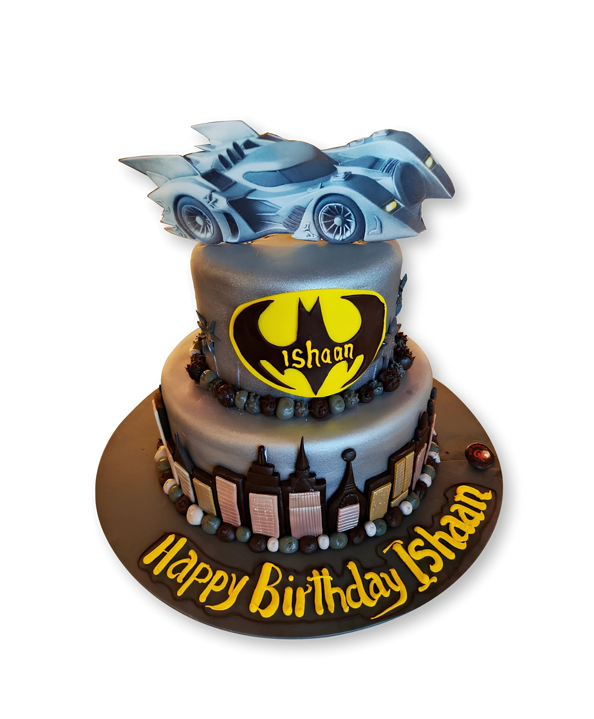 Batman themed birthday cake by Red Ribbon Cakes with superhero design and dark tones, custom boys cake in Dubai