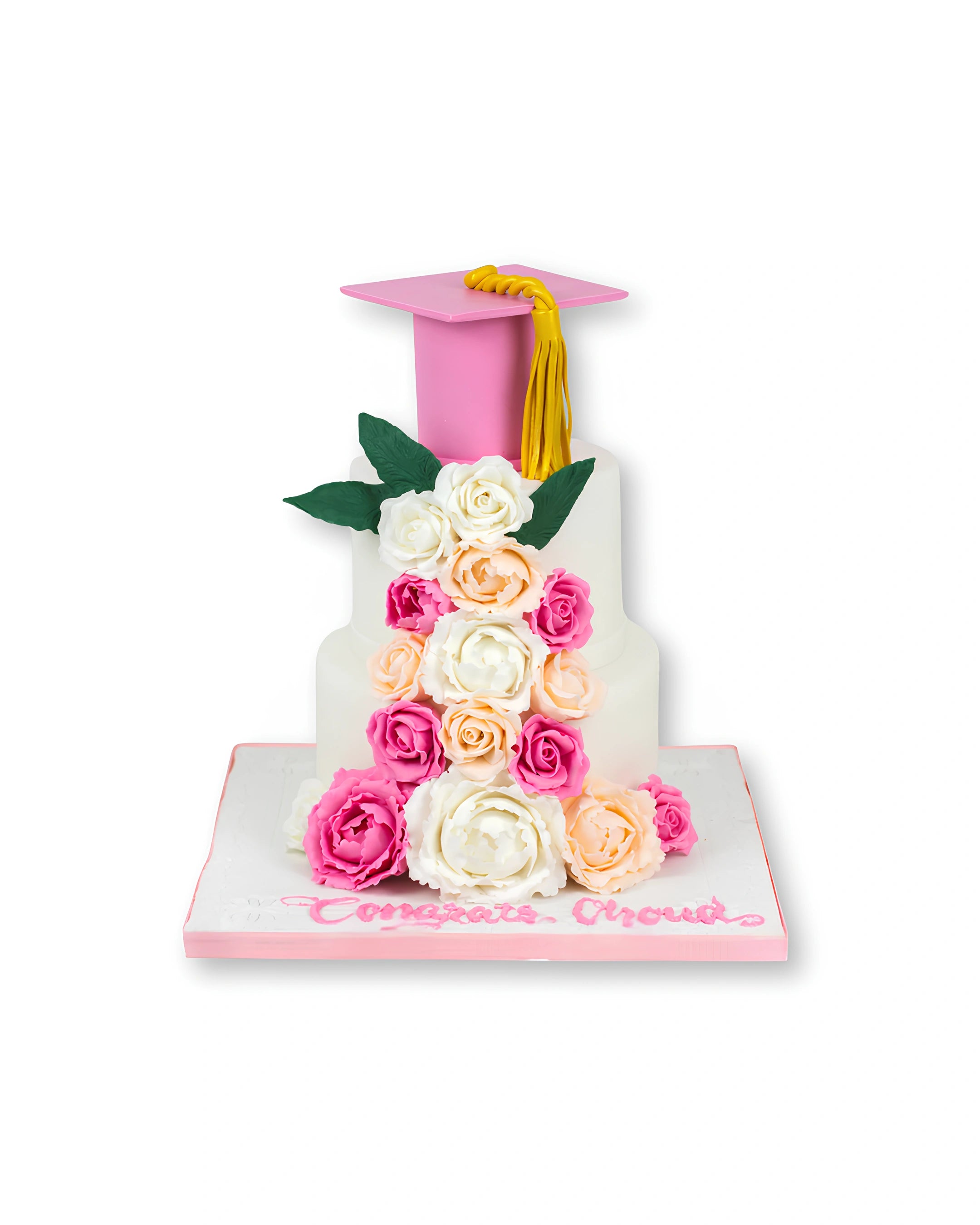 Blossom graduation cake with multi tier design, floral decorations and pink graduation cap topper, premium graduation cake by Red Ribbon Cakes Dubai