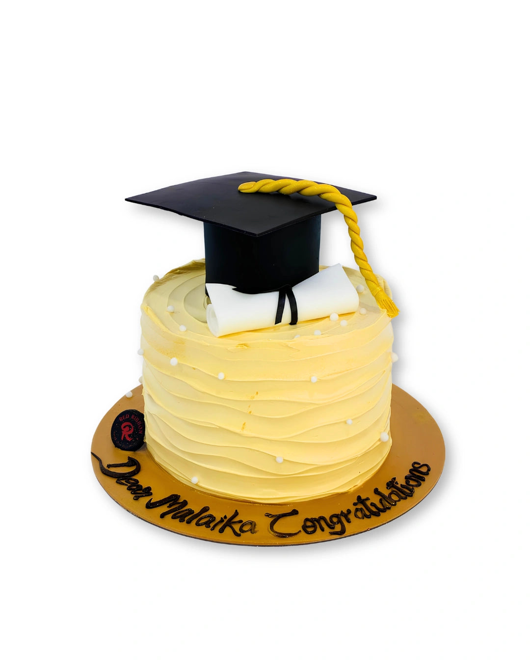 golden graduation bliss cake with buttercream finish graduation cap and diploma topper