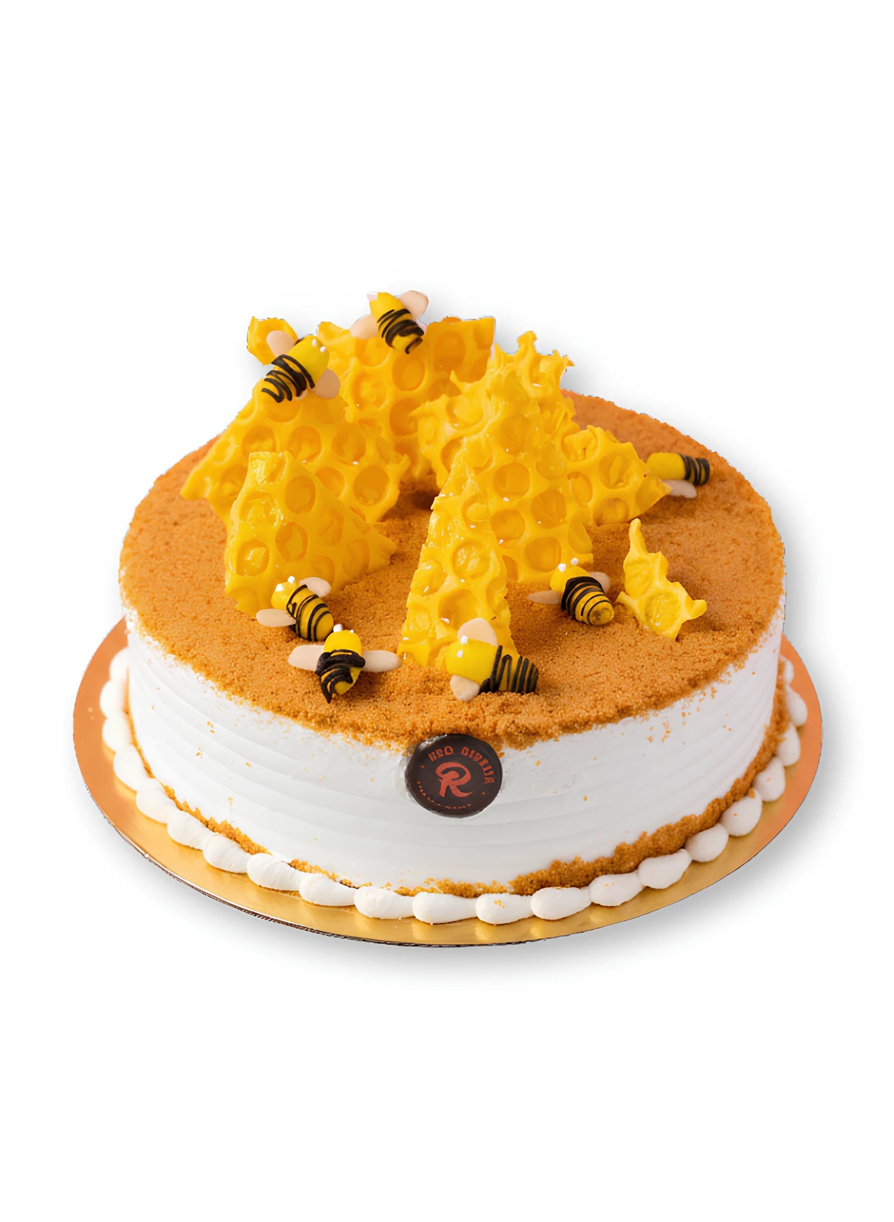 Honey Comb Cake topped with golden honeycomb shards and bee decorations by Red Ribbon Cakes