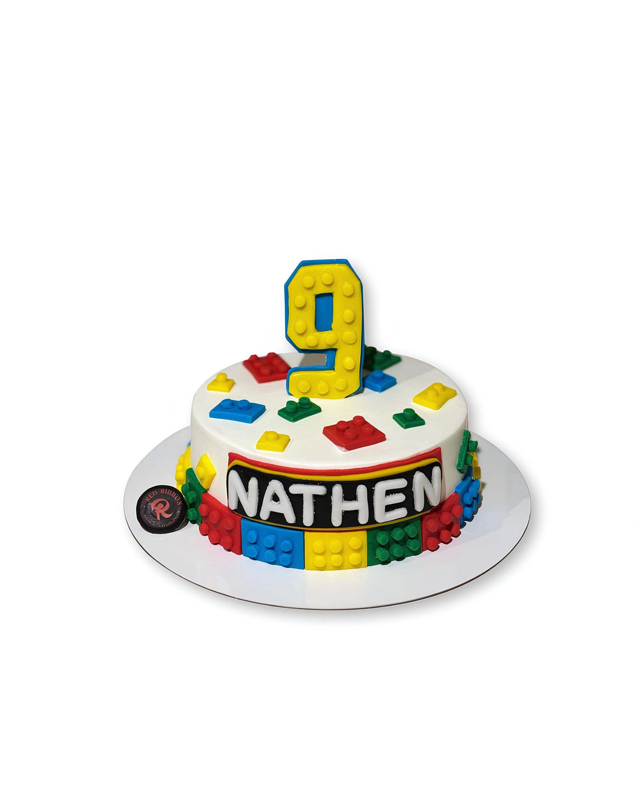 Lego themed birthday cake by Red Ribbon Cakes with colorful block design, creative kids party cake in Dubai
