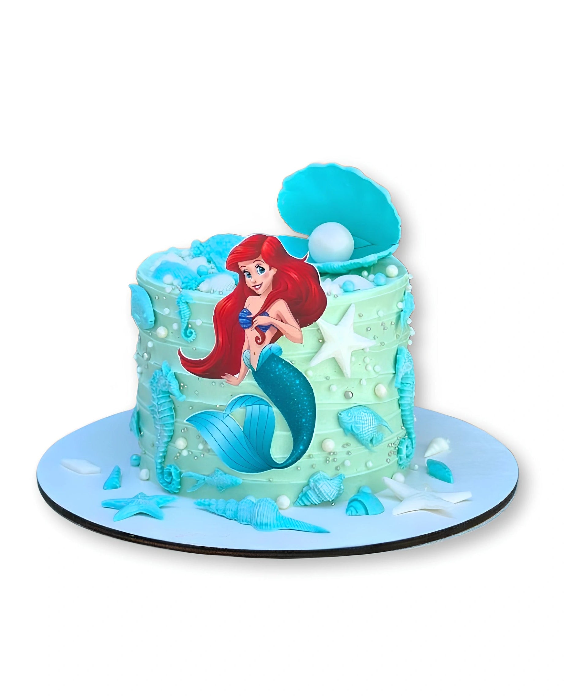 Mermaid Lagoon birthday cake by Red Ribbon Cakes featuring underwater theme and mermaid topper, custom cake for kids in Dubai