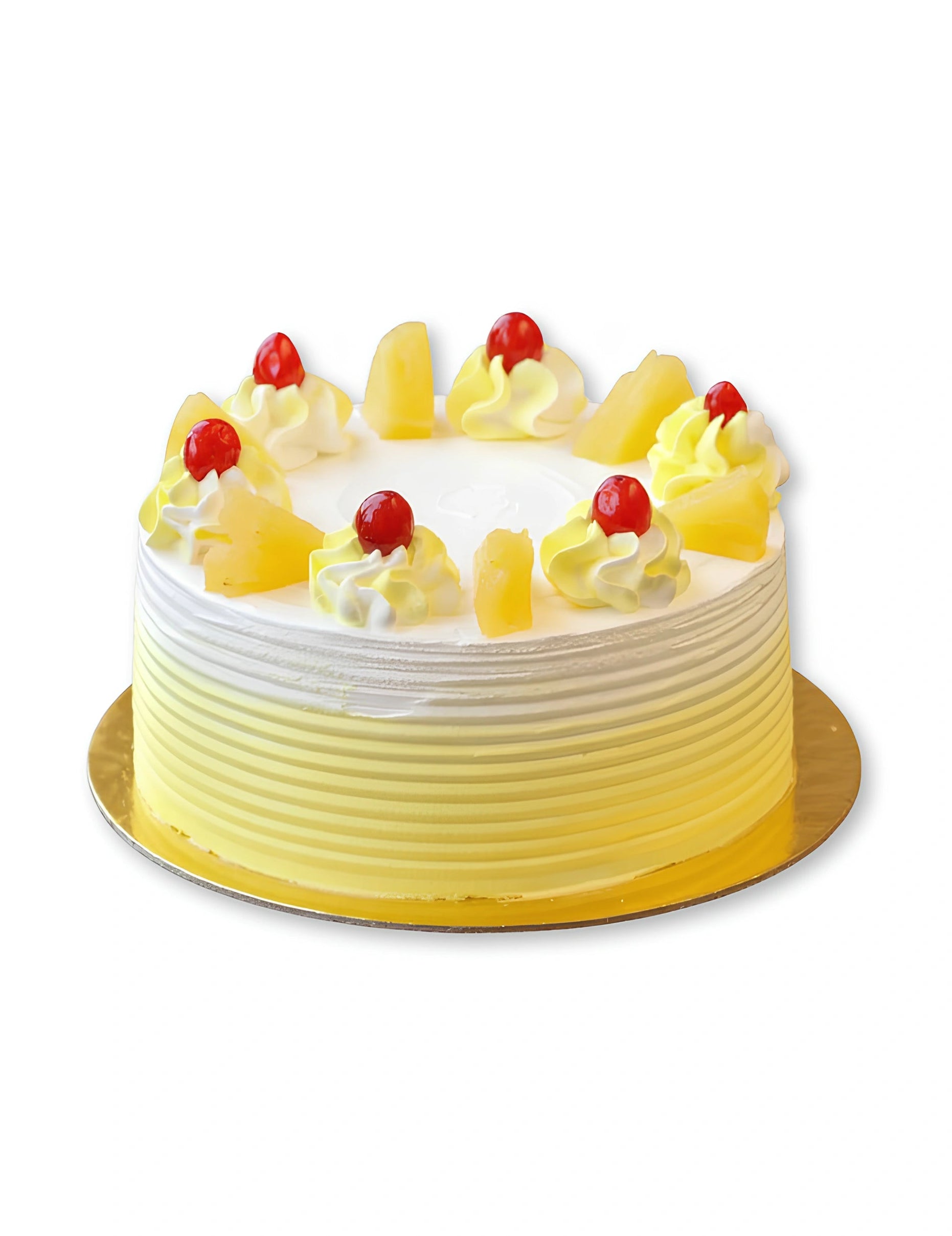 Pineapple Cake by Red Ribbon Cakes topped with pineapple chunks and cherries, soft cream cake ideal for birthdays in Dubai