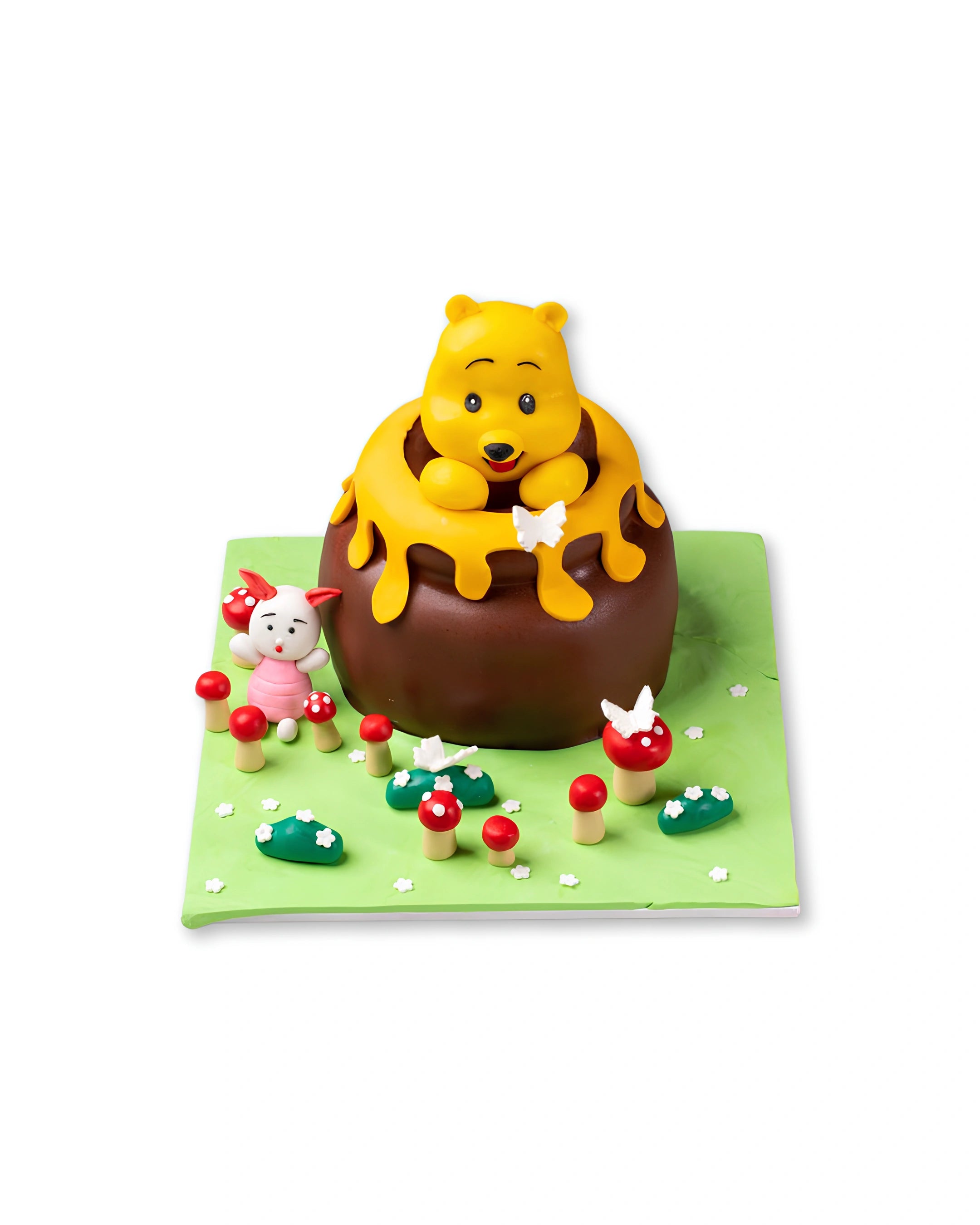 Pooh’s Honey Pot themed cake by Red Ribbon Cakes with Winnie the Pooh design, cute kids birthday cake in Dubai