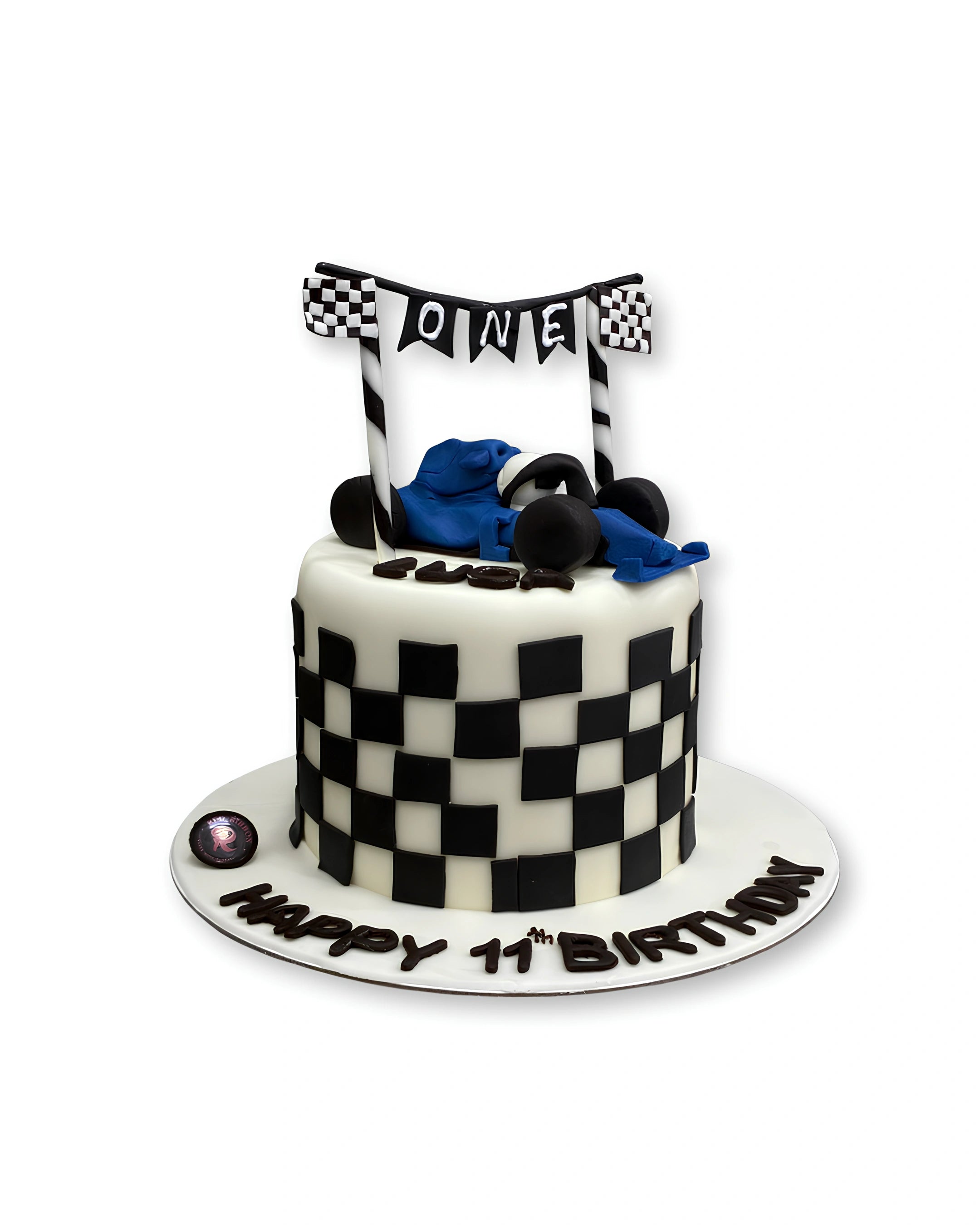 Racing finish line themed cake by Red Ribbon Cakes with checkered pattern and race car elements, custom birthday cake in Dubai